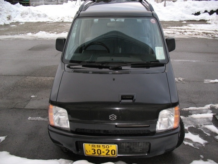 A frontal view of my car, a Suzuki Wagon R, in Japan.