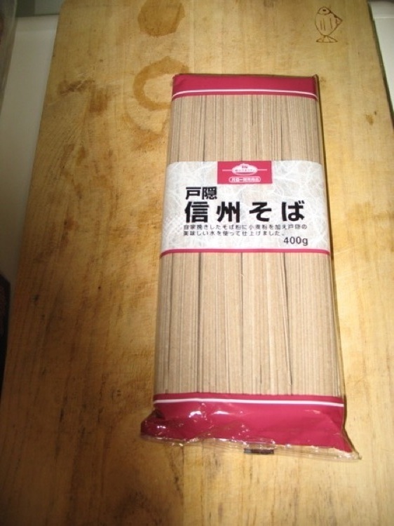 An unopened packet of soba noodles.