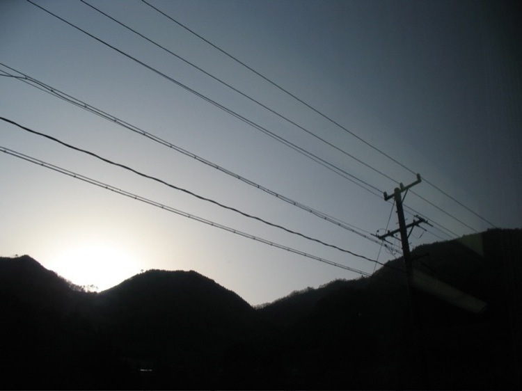 Powerlines in a blue sky.